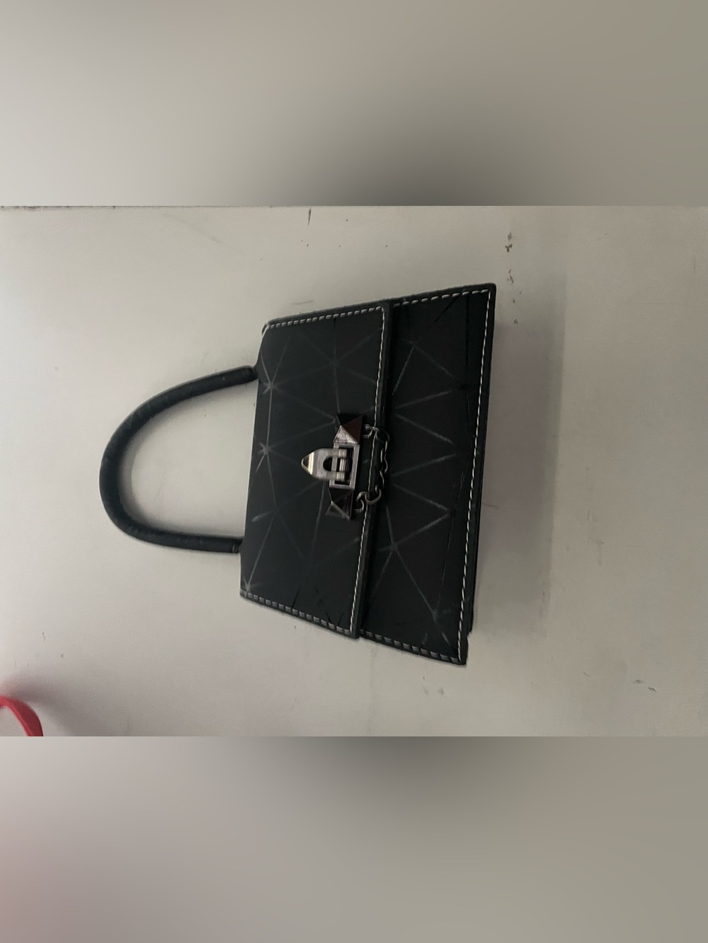 Black Geometric Top-Handle Bag with Silver Lock
